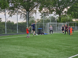 Laatste training S.K.N.W.K. JO11-1JM (partijtje tegen de ouders) van maandag 27 mei 2024 (81/137)